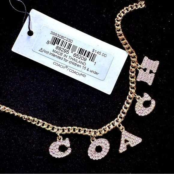 Coach Gold and Silver Charm Necklace - Picture 2 of 3